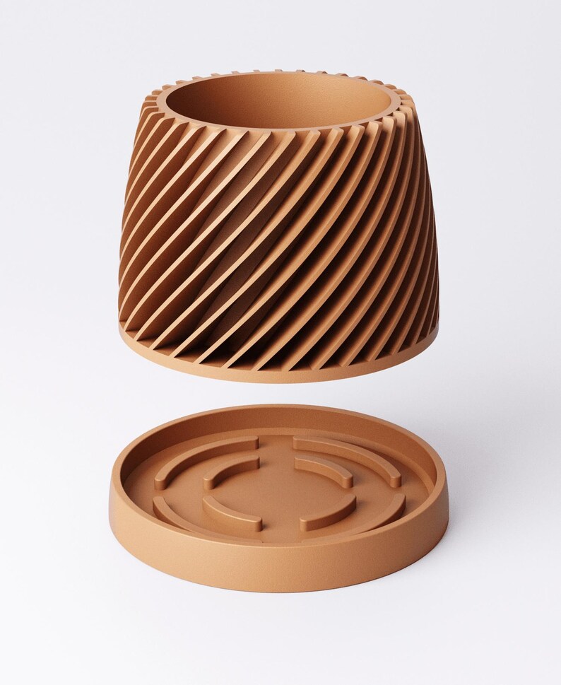 May include: A terracotta-colored planter with a unique design. The cylindrical pot features a spiral pattern of vertical slats, and sits above a matching round base. The planter is designed for indoor or outdoor use.