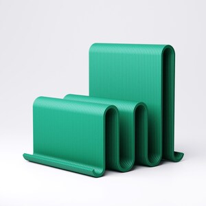 May include: Three abstract, green, wave-shaped sculptures. The sculptures have a ribbed texture and are arranged in a staggered formation. The color is a vibrant, solid green, and the background is plain white.