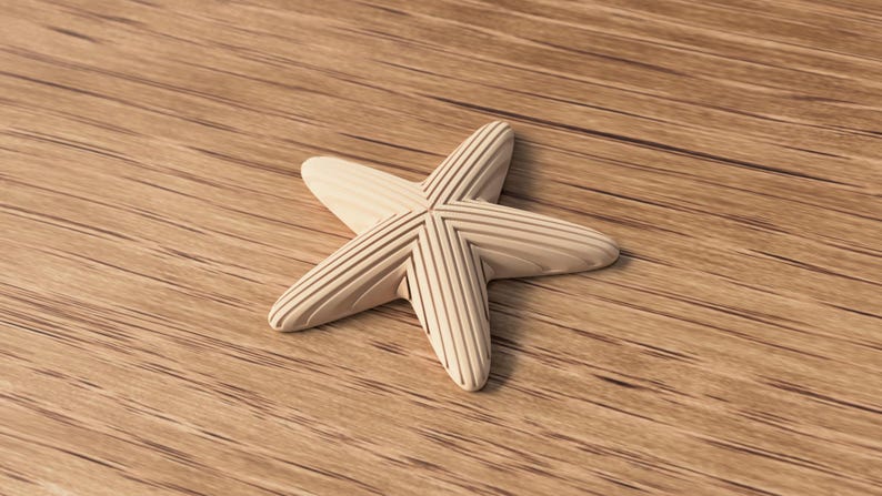 May include: A light-colored wooden starfish with carved lines on each point. The starfish is lying on a wooden surface with visible grain. The starfish is a decorative item.
