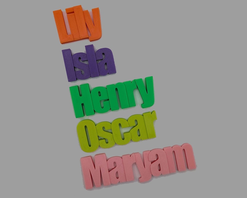 May include: A collection of colorful, 3D name cutouts in orange, purple, green, yellow-green, and pink. The names are "Liv", "Isla", "Henry", "Oscar", and "Maryam". The names are displayed on a light gray background.