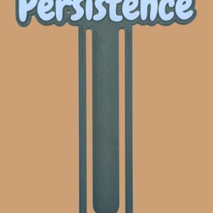 May include: A dark grey bookmark shaped like a large paperclip with the word Persistence written in light blue, rounded, bubble-style letters across the top horizontal bar. The design features a clean, matte finish and a simple, functional structure.