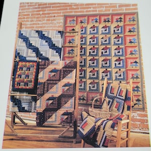 May include: A collection of colourful patchwork quilts displayed on a wooden ladder and a chair. The quilts feature various geometric patterns and designs, including squares, triangles, and diamonds. The quilts are made with a variety of fabrics, including cotton, linen, and wool.