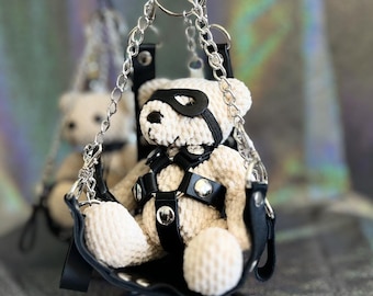 Kinky Teddy on the BDSM rocking chair | Kinky plush toy Berlin fetish cuddly toy leather and chains | playful & provocative