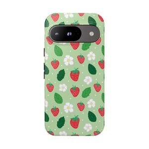 May include: A light green phone case featuring a repeating pattern of red strawberries, white flowers, and green leaves. The case has a camera cutout and black side buttons.