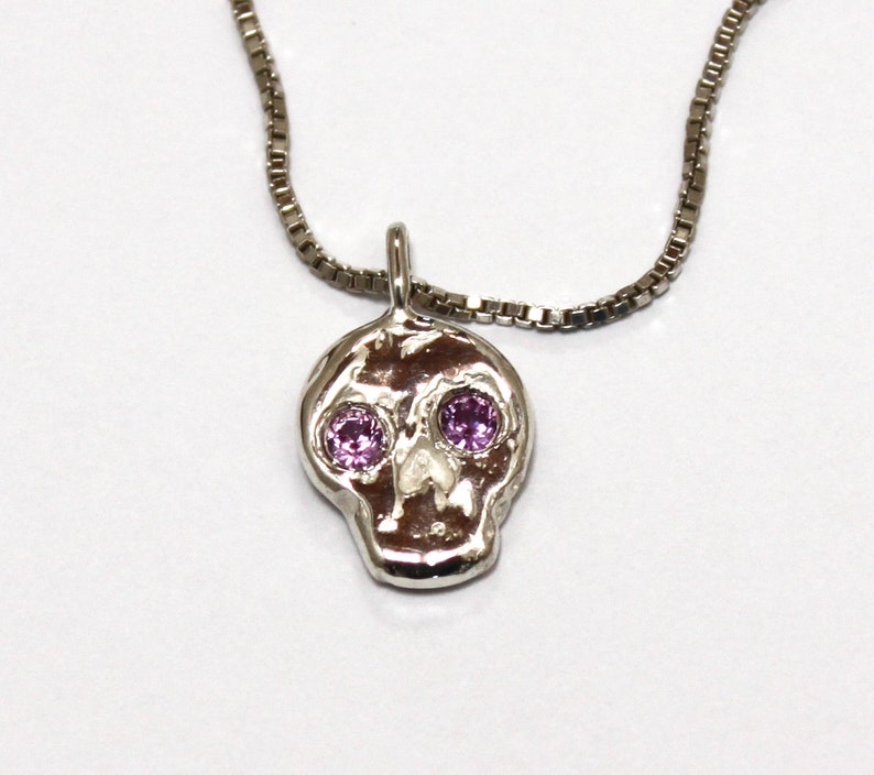 Skull friend charm with sapphire eyes image 2