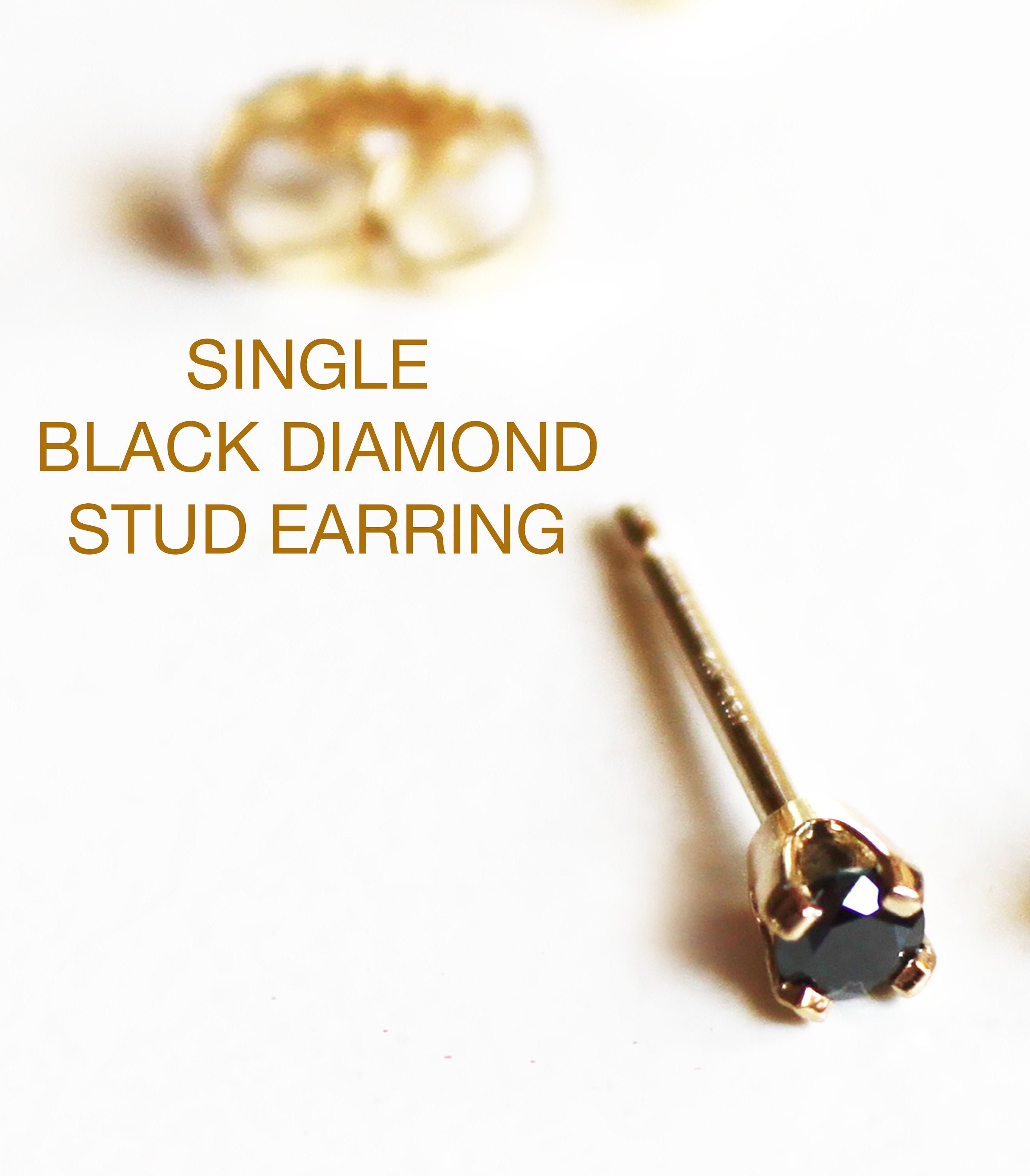 Single black stone 2024 earrings in gold