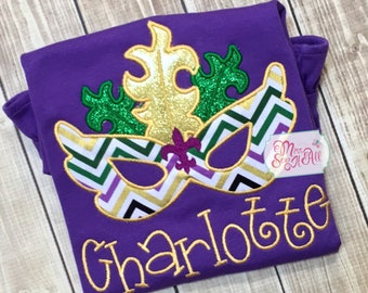 Camisetas con máscara morada de Mardi Gras