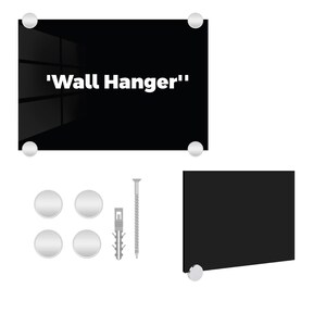 May include: Black acrylic sign with the text 'Wall Hanger' in white lettering. The sign comes with four silver mounting discs, a silver screw, and a silver plastic anchor.