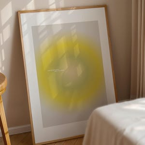 Könnte beinhalten: Ein gerahmter Druck mit einem abstrakten Design in Gelb und Grün. Der Druck enthält den Text "Atme mit deinem Körper, stelle dir vor, was dein Geist denkt".