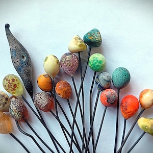 30) Handmade glass pencil beads