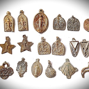 1) Small pendants - casting blanks - creative supplies for hobbyists and craftspeople, deburring or reworking is necessary.