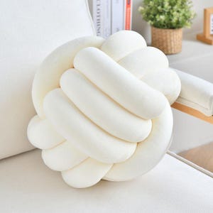 Knot Ball Throw Pillow