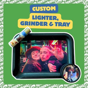 May include: A custom lighter, grinder, and tray set featuring a rectangular black tray with a photo of two people, a round black grinder with a photo insert, and a lighter with a dog image. The text reads CUSTOM LIGHTER, GRINDER & TRAY.