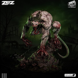 Peut inclure: Statue détaillée à l'échelle 1:6 d'une créature monstrueuse avec une apparence de Joker. La figurine est pâle avec des muscles exposés, des griffes acérées et une longue langue rouge. La statue est posée sur une base rocheuse avec un fond sombre et menaçant.