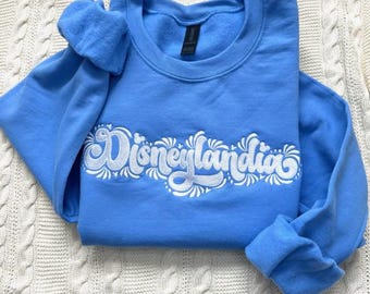 Sweat-shirt brodé Disneylandia | Conception Talavera | Couleurs personnalisées