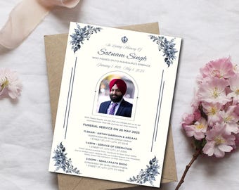 May include: A white funeral announcement card with blue floral accents and a photo of a man in a turban. The card includes the text "In Loving Memory of Satnam Singh" and details the funeral service and cremation.