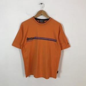 Vintage benetton formula 1 racing team tshirts