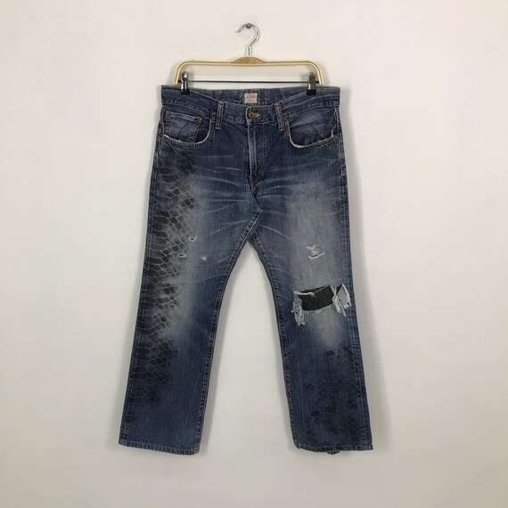Vtg Edwin distressed patchwork Snake design jean … - image 1