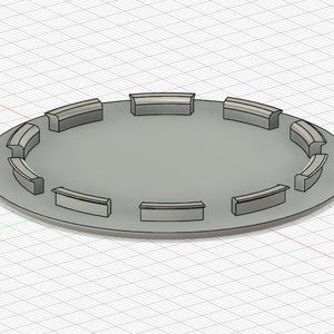 以下が含まれることがあります： グレーの円形プラットフォームで、周囲に等間隔に配置された、湾曲した長方形の構造があります。 このデザインは3Dレンダリングであり、潜在的な建築またはデザイン要素を示唆しています。