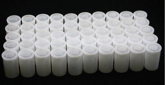 100 containers/canisters--35mm Fuji plastic film containers (canisters) Il_570xn