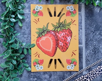 May include: A yellow background with two red strawberries, one with a heart shape cut out of it. The strawberries are surrounded by small white flowers and green leaves.