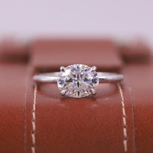 East to West Oval Cut D Color VVS1 Clarity IGI Certified Lab Grown Diamond Solitaire Engagement Ring, 14k Gold Claw Prongs Ring