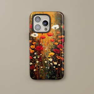 May include: A phone case featuring a vibrant floral painting. The artwork showcases red, orange, yellow, and white flowers against a warm, golden background. The case has a glossy finish and a protective design.