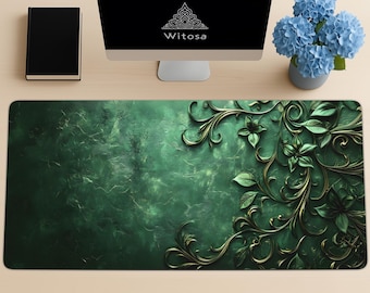 May include: A green and gold floral design mousepad with a textured background. The mousepad has a dark green base with gold floral accents. A computer monitor with the word "Witosa" is visible.