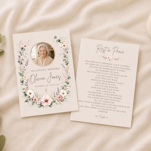 May include: Two rectangular funeral memorial cards on a light background. The left card features a circular photo of a person, the text In Loving Memory, Olivia Jones, dates, and a floral wreath. The right card displays Rest in Peace and Psalm 23.
