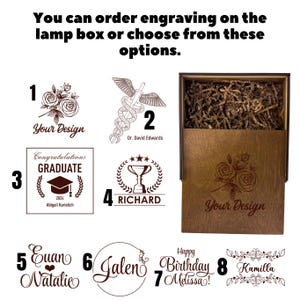 May include: A wooden lamp box with a floral design and the text "Your Design" is shown. The image also displays several engraving options, including a medical symbol, a graduation design, a trophy, and names.