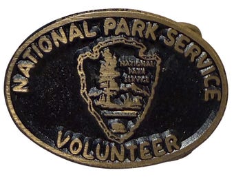 Hebilla de cinturón vintage del Servicio Voluntario de Glacier Bay del Parque Nacional con punta de flecha de latón