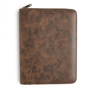 May include: A rectangular brown portfolio case with a textured, distressed finish. The case features a curved vertical seam on the left side and a silver-toned metal zipper closure at the top. The surface has a mottled appearance with dark brown tones.