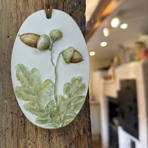 Made from REAL PLANTS! Watercolour painted hanging Room diffuser,beautiful,handmade,cast from real oak leaves. With a bottle of Amber scent.