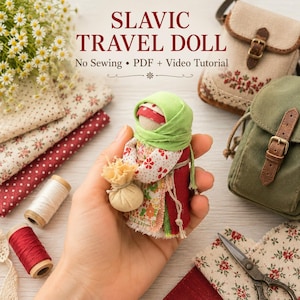May include: A small fabric doll wearing a green headscarf and a red dress with floral patterns, holding a tiny beige sack. The text SLAVIC TRAVEL DOLL No Sewing PDF + Video Tutorial is visible above the doll, surrounded by fabric scraps, spools of thread, scissors, and two small bags.