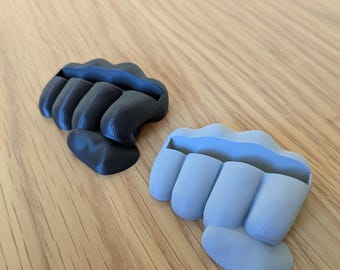 Spremi-dentifricio a forma di pugno stampato in 3D: un salva-bagno originale