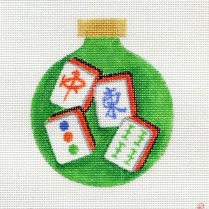 May include: A green glass bottle ornament filled with colorful mahjong tiles. The tiles have Chinese characters and dots.