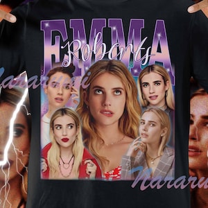 Peut inclure: T-shirt noir avec un collage d'images d'Emma Roberts et le nom "EMMA Roberts" dans une police rétro violette et blanche. Le design comprend un éclair et le mot "Nararuki".