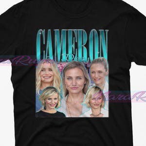 May include: Black t-shirt with a vintage-style graphic of Cameron Diaz. The graphic features multiple images of Diaz in a collage style with the text "Cameron Diaz" in a blue and green gradient.
