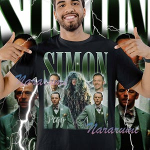 May include: Black t-shirt featuring a graphic of Simon Pegg with the name "Simon Pegg" in a vintage style. The design includes images of Simon Pegg in various roles, with a green and white lightning bolt background.