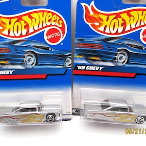 Hot Wheels &#39;59 Chevy Impala low rider with skirts and a beautiful paint job and real nice graphics from 1999  collector #116