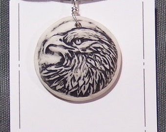 Handmade, relief carved porcelain Hawk pendant/necklace