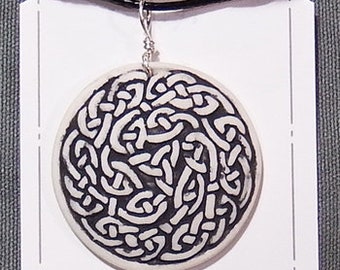 Handmade, relief carved porcelain Celtic knot pendant/necklace