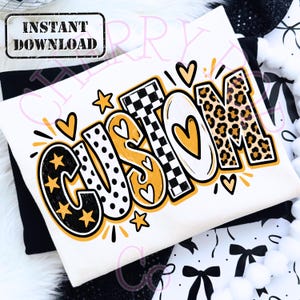 May include: A white t-shirt featuring the word CUSTOM in large, stylized letters. Each letter has a unique pattern including black stars, white polka dots, a black and white checkerboard, a solid white heart, and a brown leopard print.