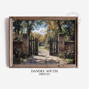 May include: A framed print of a garden scene. The artwork depicts an open wooden gate leading to a stone path, with brick pillars and colorful flowers on either side. The text "DANDEE SOUTH PRINTS" is at the bottom.