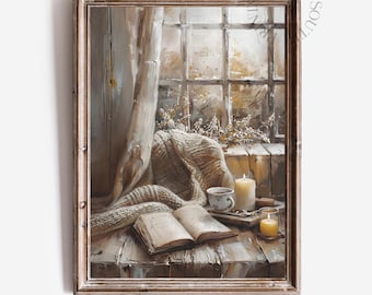 May include: A framed print of a cozy scene with a window, a knitted blanket, and an open book. A cup of coffee, candles, and the text "DANDEE SOUTH PRINTS" are also visible. The color palette is warm, with neutral tones.