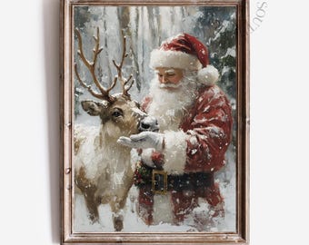 May include: Framed print of Santa Claus feeding a reindeer in a snowy forest. Santa wears a red suit and hat with a white beard. The reindeer has large antlers. The print is in a wooden frame. Text at the bottom reads "DANDEE SOUTH PRINTS".