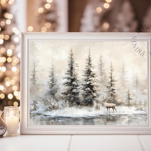 May include: A framed winter landscape painting featuring a serene forest scene with snow-covered trees and a deer standing near a body of water. The artwork is in a white frame, evoking a sense of tranquility and the beauty of nature.