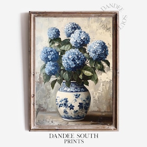 May include: A painting of a blue and white porcelain vase filled with blue hydrangeas. The vase has a floral design and is sitting on a wooden table. The background is a light beige with a textured look.