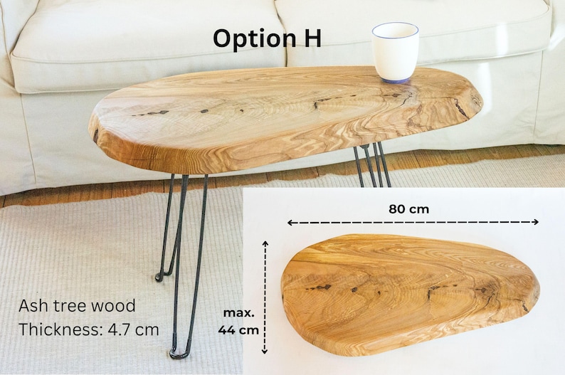 Solid wood couch table with live edge design, featuring waxed finish and industrial-style metal legs, ideal as a low-profile sofa side table.