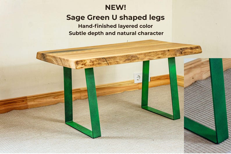 Sage green metal table legs in handmade layered finish with subtle patina effect, unique color option for live edge solid ash wood coffee table, Scandinavian style natural furniture detail, green U shaped steel legs close up showing textured matte surface and artisan craftsmanship, modern organic interior design accent